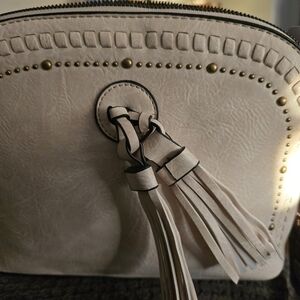 Textured Cream Tassel Crossbody Bag with Stud Accents